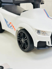 AUTIĆ NA GURANJE SA RUČKOM I MUZIKOM AUTIĆ NA GURANJE SA RUČKOM I MUZIKOM